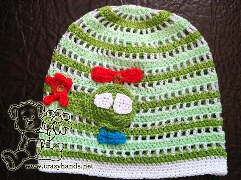 crochet baby boy's hat decorated with crochet helicopter