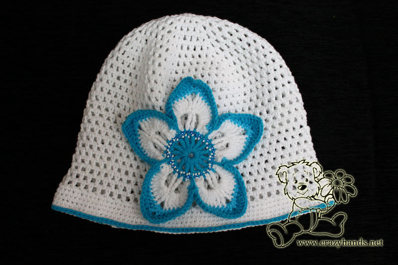 crochet baby girl spring hat with flower pattern