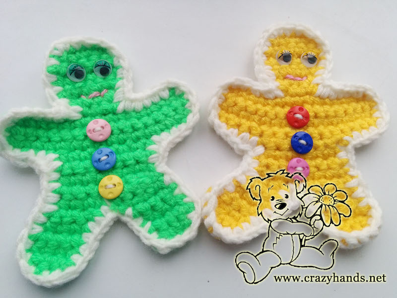 two crochet gingerbread men - one green and one yellow