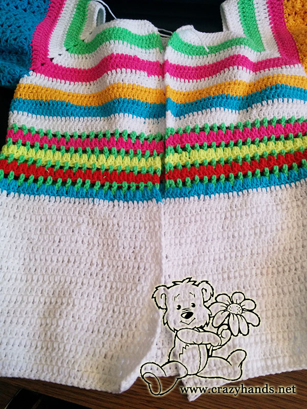 finished body of the crochet rainbow sweater cardigan for baby girl