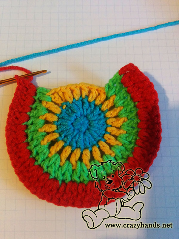 forming crochet pocket for rainbow cardigan - step three