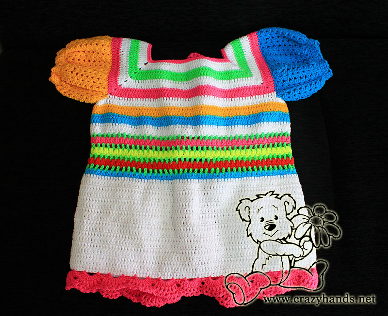 finished crochet rainbow sweater cardigan for a baby girl - backside view