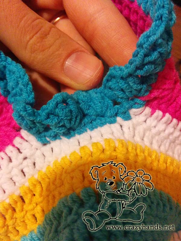 forming the sleeves of the crochet rainbow cardigan - step four