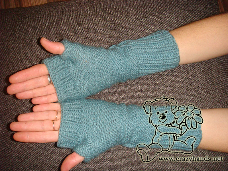 woman wears fingerless gloves - bottom side