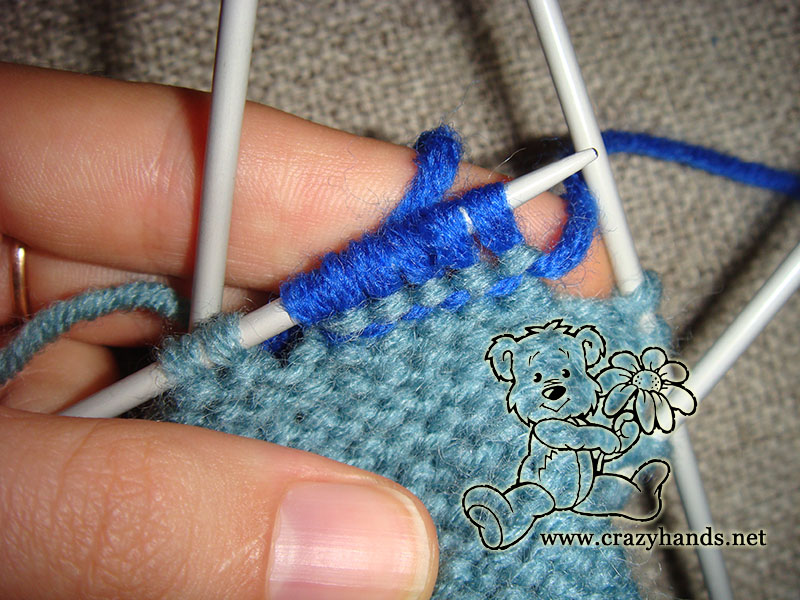 knitting gusset section of fingerless gloves - step two