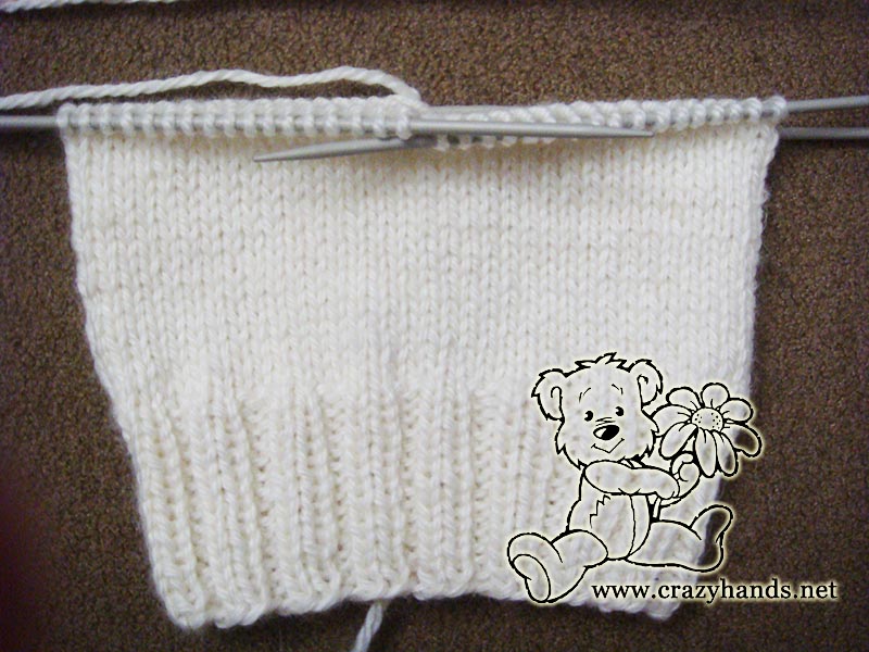 knitting body of the baby beanie