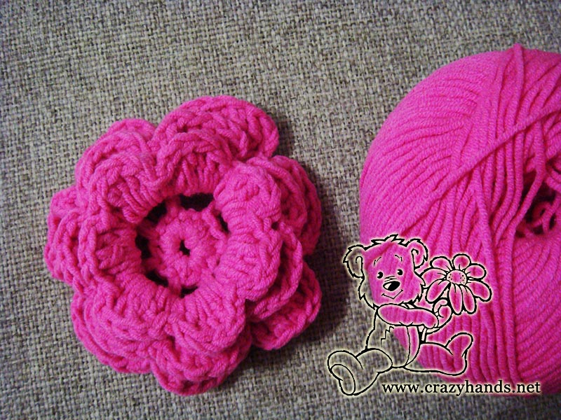 crochet triple petal flower made with pink yarn