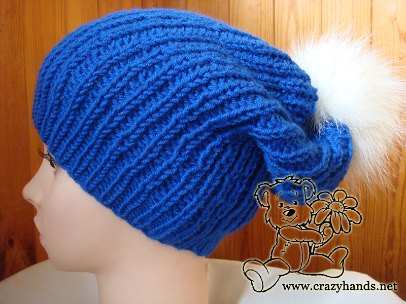 slouchy knit hat with white arctic fox fur pom pom