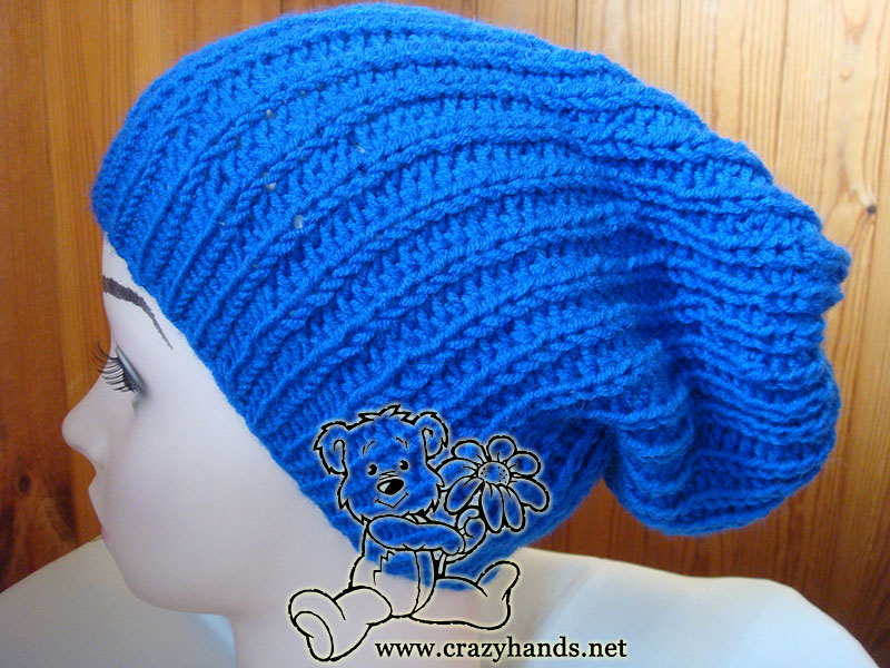 blue slouchy knit hat on the mannequin