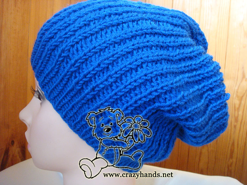 blue slouchy knit hat made on the straight needles shot on the mannequin