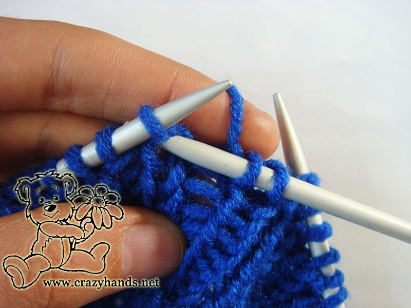 second step in knitting the fisherman's rib stitch for slouchy hat