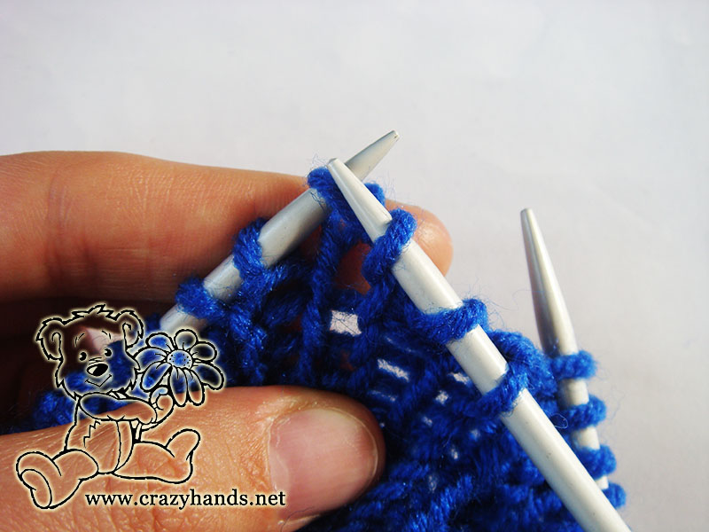 third step in knitting the fisherman's rib stitch for slouchy hat