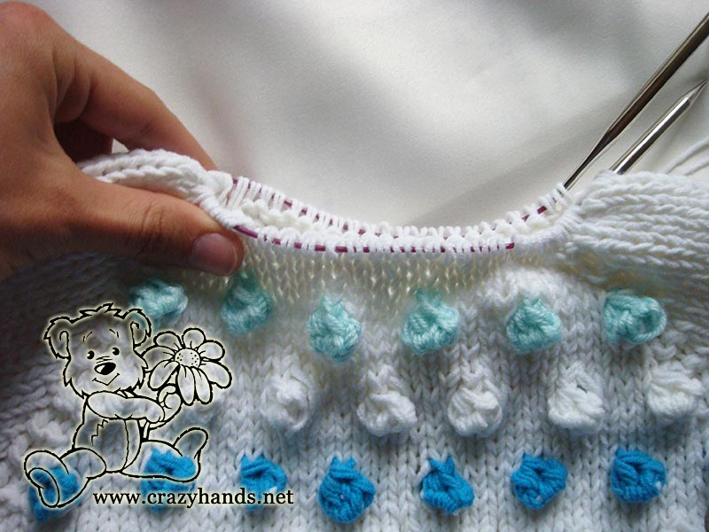 knitting the neck of seamless bottom-up raglan sweater for baby - step one