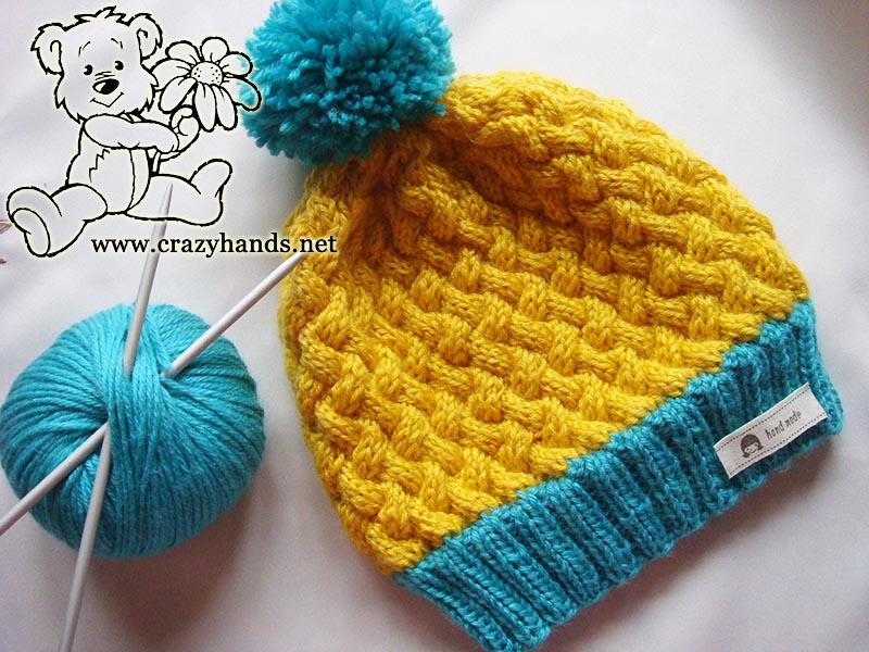 simple knit hat with yarn pom pom