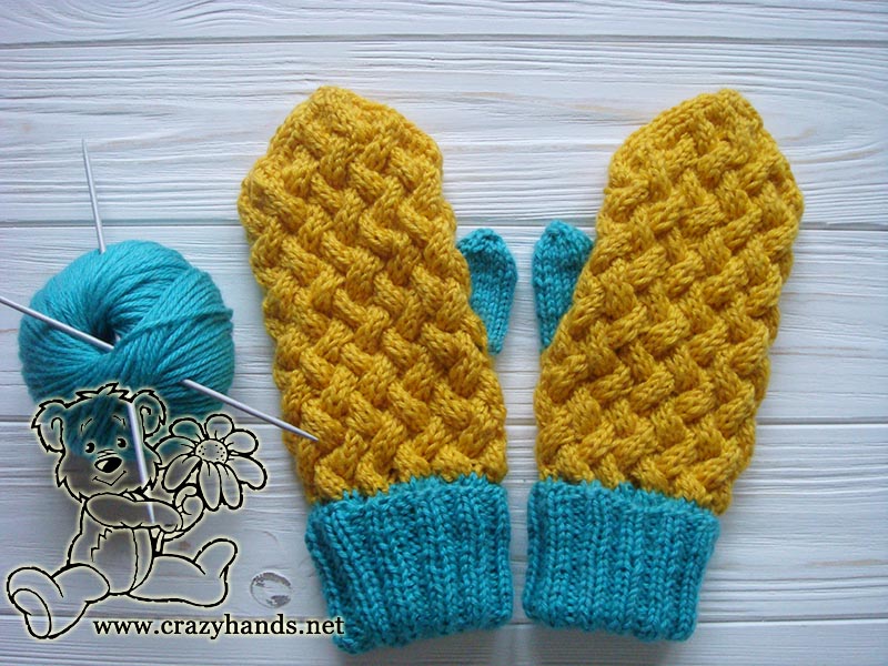 swedish style knit mittens, straight needles and a skein of yarn