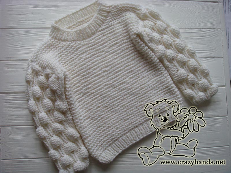 chunky white oversized knit sweater with bobbles for toddlers