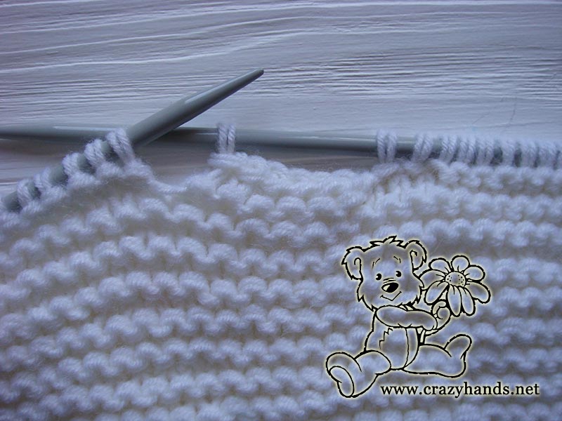 shaping neckline of the front part of oversized knit sweater for toddlers - row one photo one