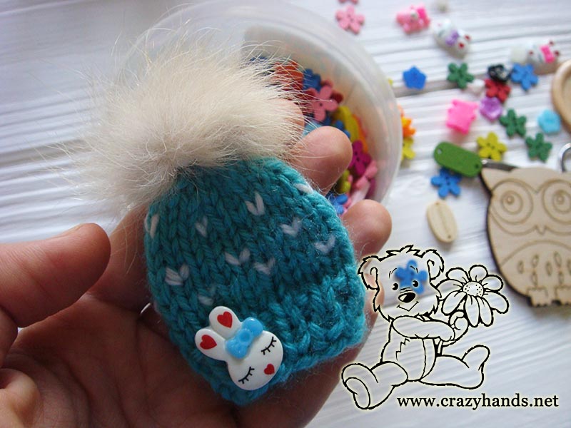 knit blue mini hat with fur pom and decor bunny