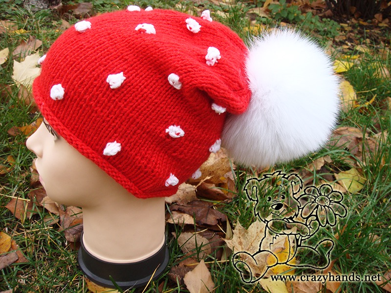 Santa-Style Knit Hat with Pom Pom on Mannequin - side view