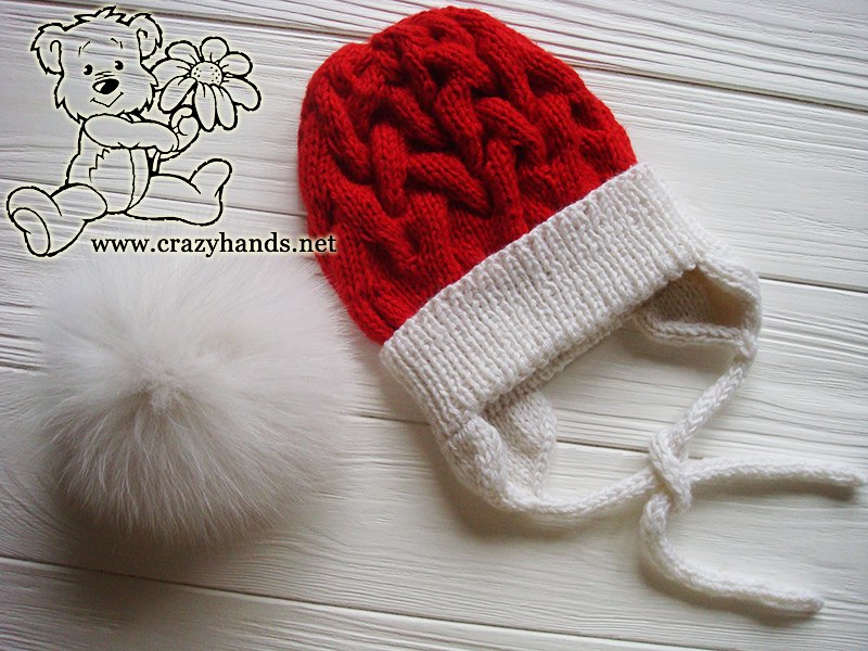 baby santa cable knit hat with earflaps and white fur pom pom