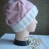 pink marshmallow cable knit hat on the mannequin - right side view