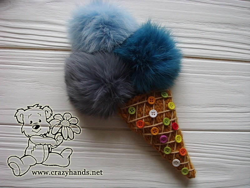 decorated knit ice cream cone with waffle buttons embroidery and fur poms