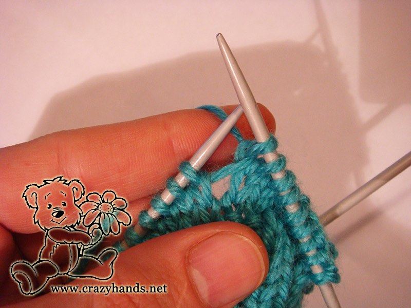 make one left knitting stitch - step three