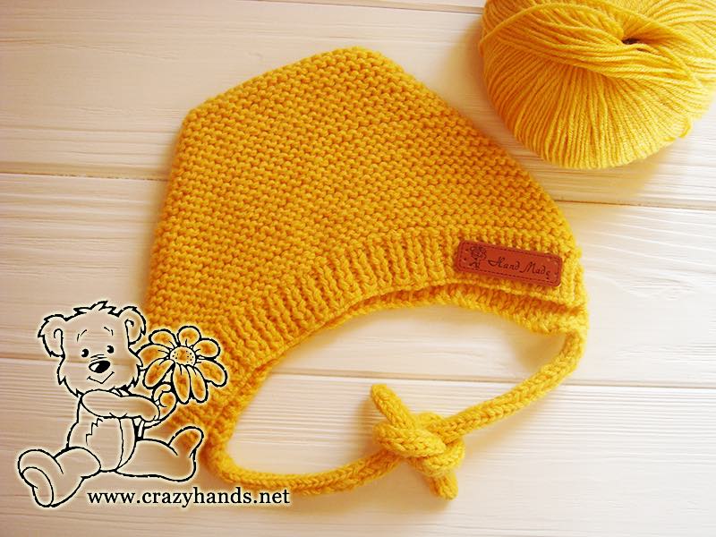 baby-bear-knit-bonnet-with-yarn-ball