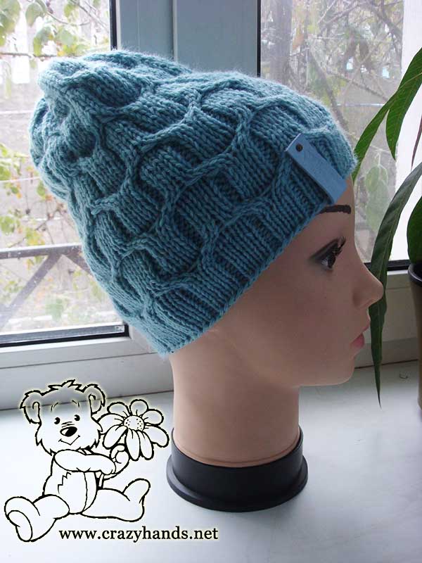 slouchy winter knit beanie on mannequin head - right side view