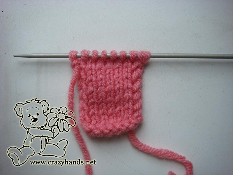cast on bow knot for the pink rose fisherman's rib knit headband