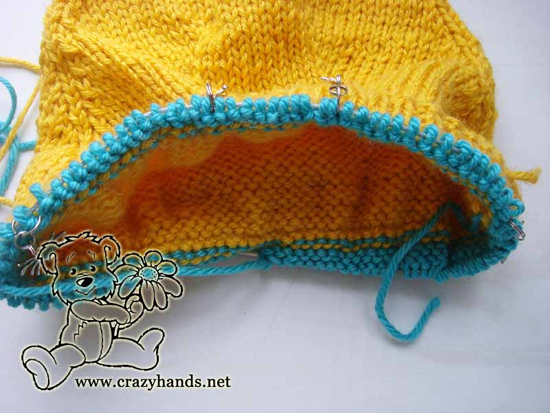 picking up stitches for the outer layer baby pixie hat