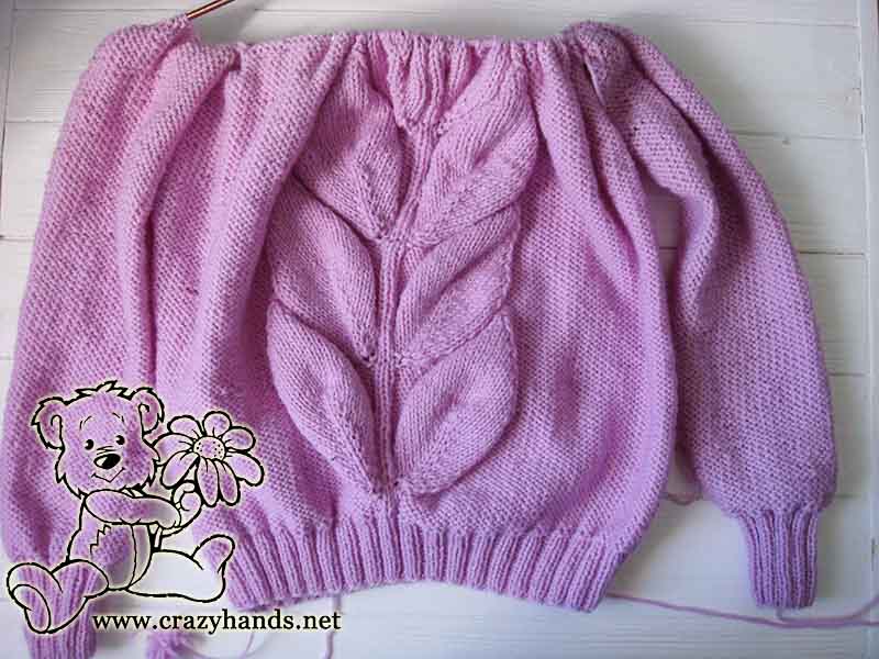 Joining the sleeves to the body of the knit leaf sweater