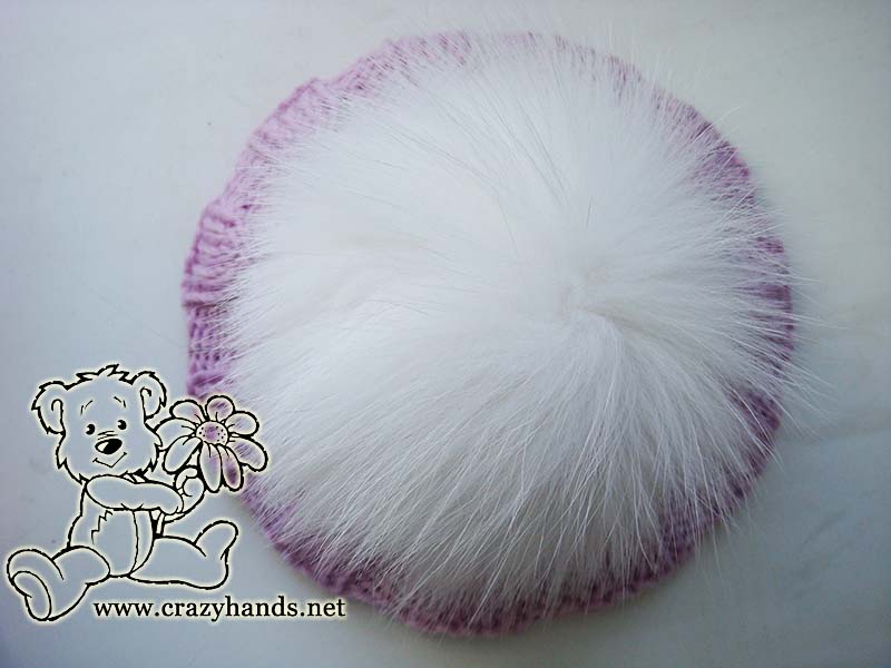 knit hat with white arctic for pom pom