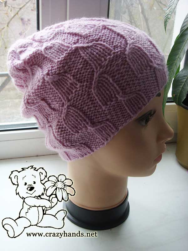 knit magnolia pink hat on the mannequin