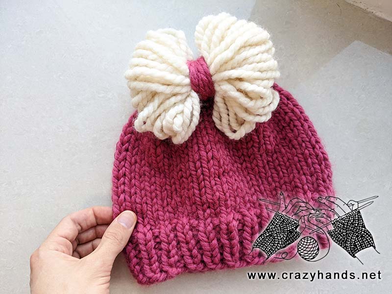 violet chunky knit hat for toddlers with white bow