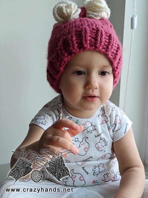 toddler gir wears chunky knit hat