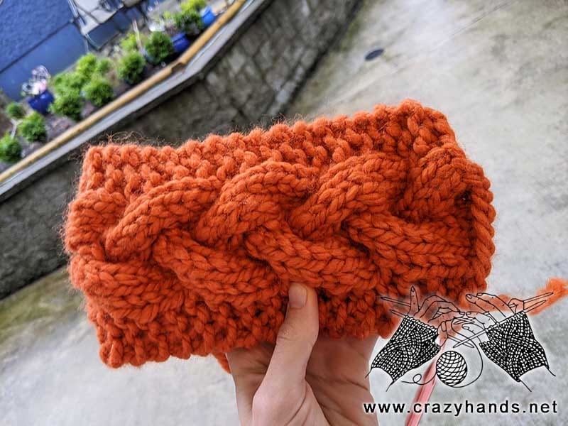 orange cable knit headband made with super bulky yarn