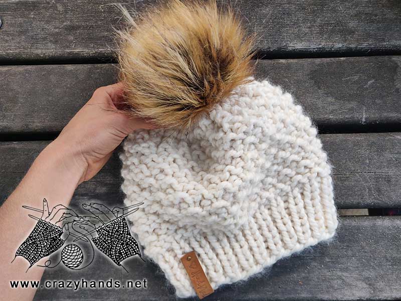Snowflake chunky knit hat with faux fur pom pom