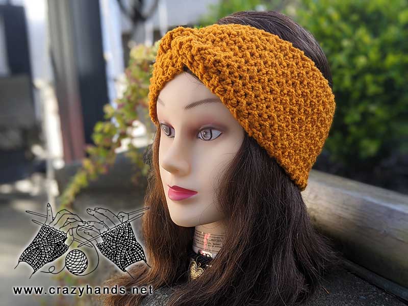phoenix crochet ear warmer on mannequin head - right side view