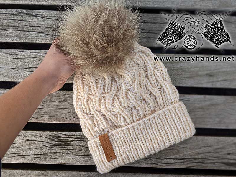 liana bulky cable knit hat with fur pom pom