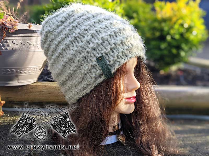 misty moss knit beanie on mannequin head - right side view