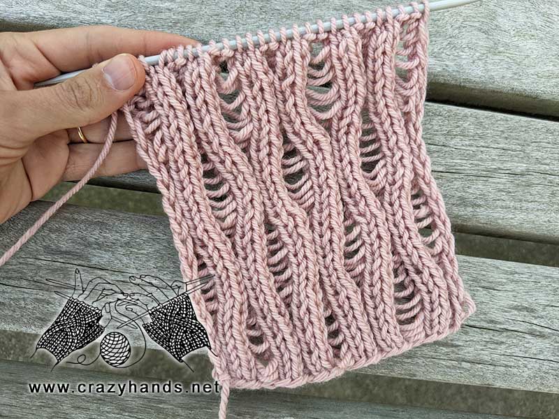 summer knit stitch with holes and unraven stitches