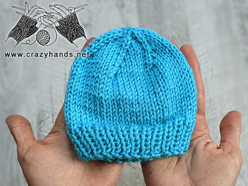 preemie knit hat made with light blue yarn