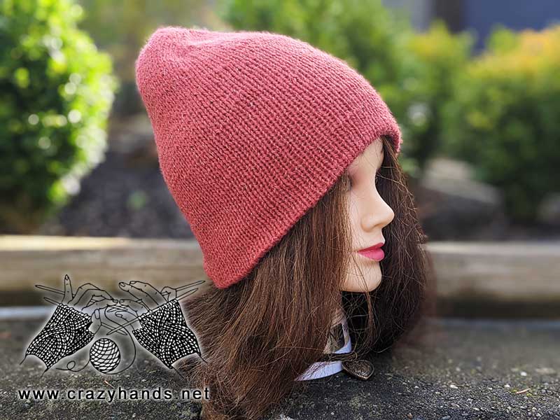 side view of the double layer reversible knit hat on a mannequin's head