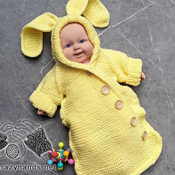 knit baby sleep wrap with bunny ears for a newborn baby