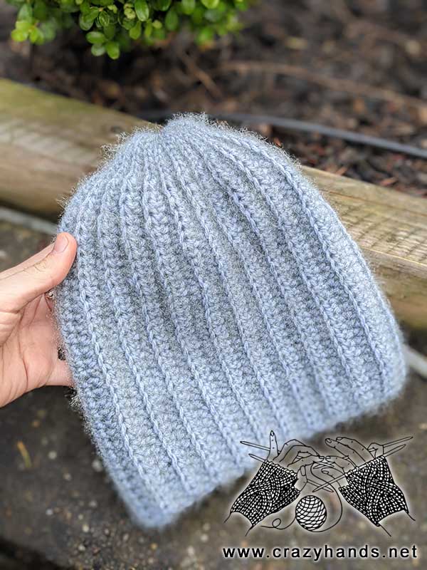 crochet classic beanie in gray color and simple ribbing-like pattern