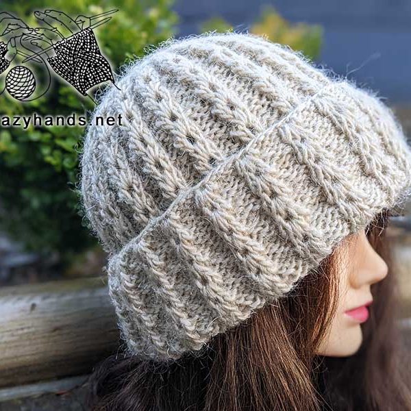 sage knit hat with double brim on the mannequin head