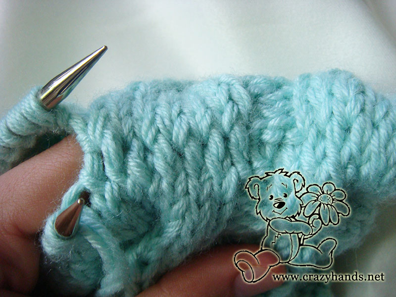 horizontal invisible seam of cable knit baby hat