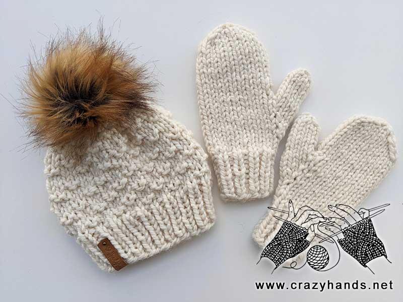raindrops chunky knit hat and matching chunky knit mittens made with white yarn