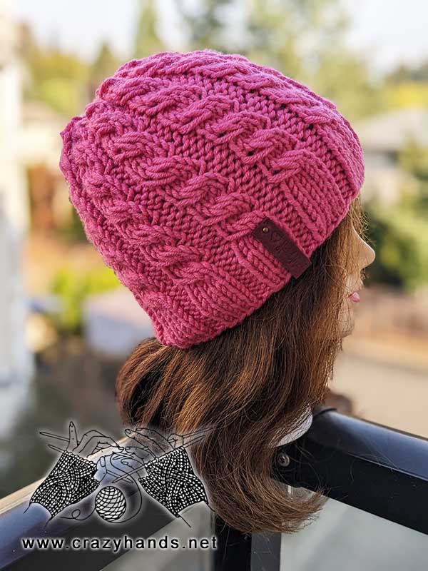 flat knit cable hat on mannequin head